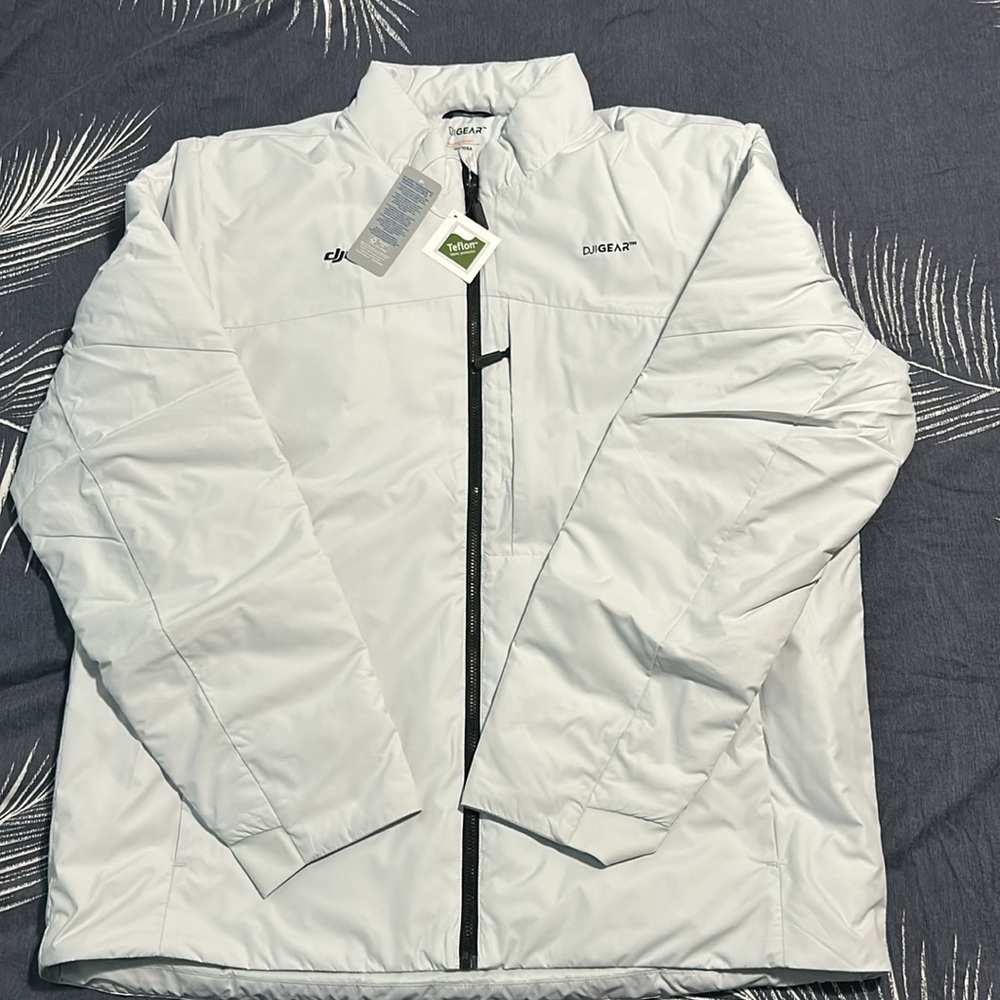 DJI insulated jacket ( brand new )
